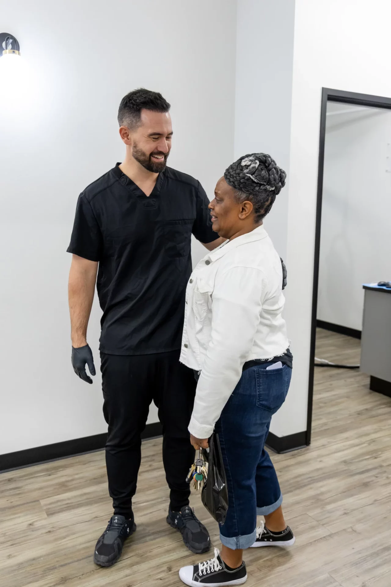 Image of our Dentist with patient