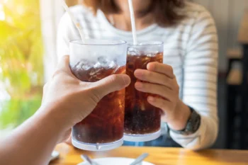 Soda and soft drinks commonly listed as foods that damage teeth and cause enamel erosion