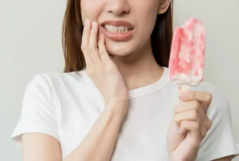 Tooth sensitivity to hot, cold, or sweet foods as one of the signs you need to visit a dentist