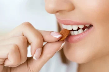 How a Full Smile Makeover Can Transform More Than Just Your Teeth 6 Patient enjoying improved bite and speech following full smile makeover treatment