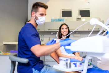 Dentist providing gentle patient-focused care at Redeemed Smiles dental clinic
