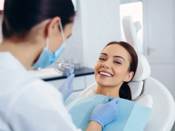 Can Flossing Stabilize Your Blood Sugar? 4 Dental hygienist demonstrating flossing as part of preventive dental care appointment