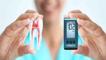 Can Flossing Stabilize Your Blood Sugar? 2 Dentist educating patient on flossing and its connection to oral health and blood sugar levels