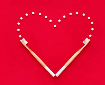 Dentist promoting Valentine’s Day oral health campaign focused on healthy smiles healthy hearts