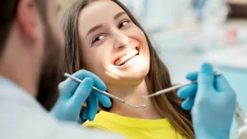 Dental office appointment scheduling for February smile checkup promoting love your smile again care