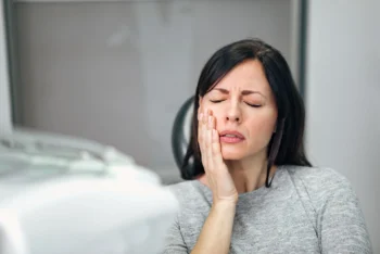Patient experiencing tooth sensitivity and seeking smile upgrade Yukon OK dental treatment