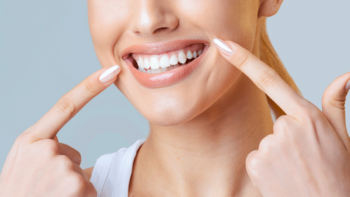 Dental comparison chart explaining veneers vs whitening for cosmetic smile improvement