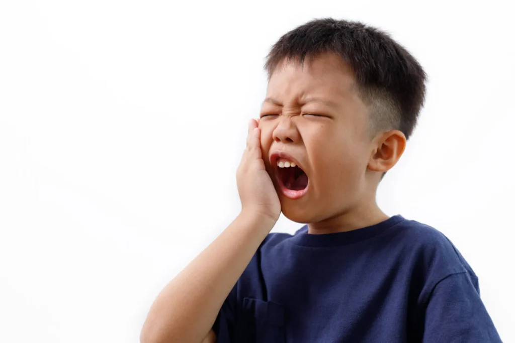 Patient experiencing constant tooth pain or sensitivity at Dentist in Yukon OK clinic