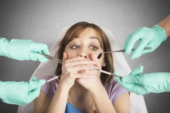 Top Signs You May Need Cosmetic Dental Treatment in Yukon OK 7 Woman overcoming dental anxiety at cosmetic dentist Yukon OK office