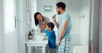 Family brushing teeth together in Yukon OK