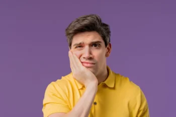 What Causes an Unsalvageable Tooth? 2 A man with Unsalvageable Tooth.