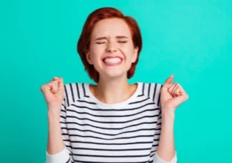 Patient smiling after treatment at cosmetic dentist Yukon OK